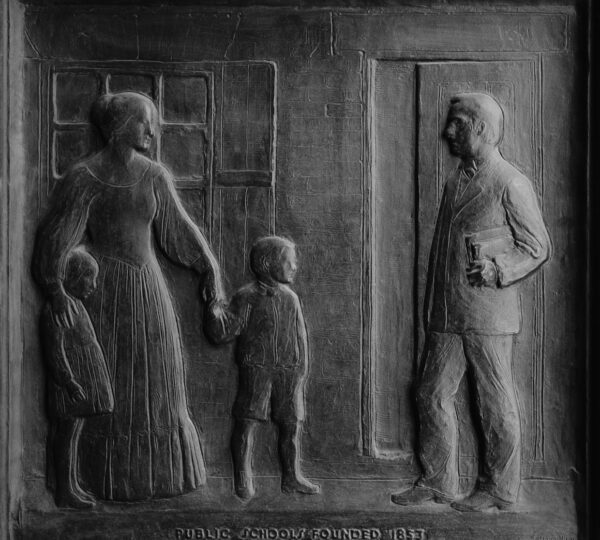 grayscale photo of man and woman holding hands together